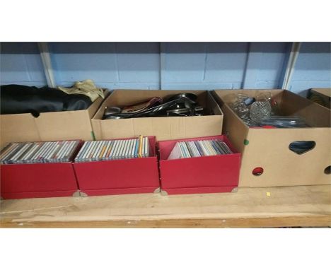 Shelf of CDs etc.