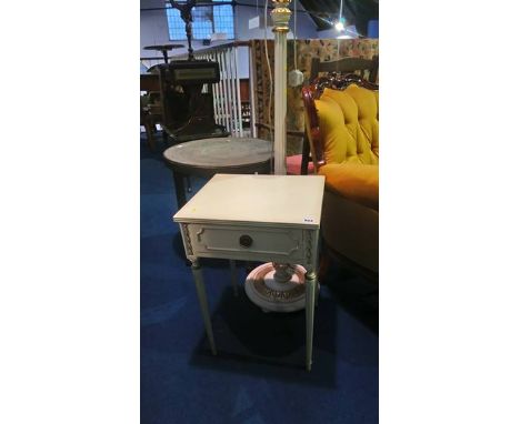 Cream standard lamp and side table