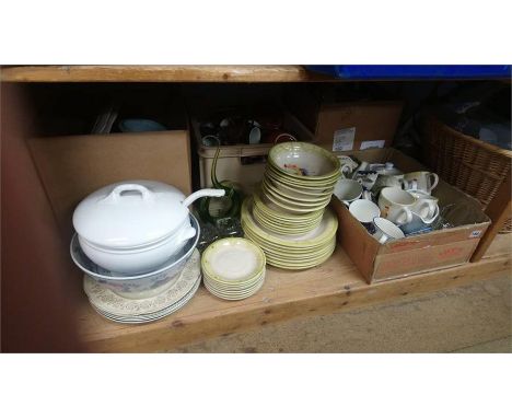 Shelf of various dinner china