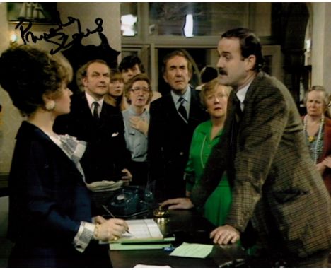 British Actress Prunella Scales Signed 10x8 Inch Colour Fawlty Towers Photo. Signed in black ink. Good condition. All autogra