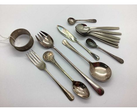 A Hallmarked Silver Dessert Fork, Birmingham 1929, together with a Victorian hallmarked silver decorative napkin ring, London