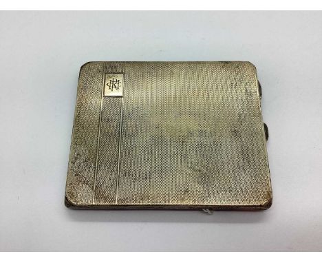 A Hallmarked Silver Cigarette Case, allover engined turned, initialled, engraved to inner "Con. Dec 25th 1931" (150grams).