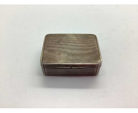 Asprey London; A Hallmarked Silver Snuff Box, London 1913, of allover engine turned design, gilt wash lining to inner (worn),