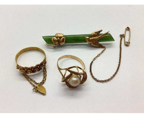 A Green Hardstone Panel Bar Brooch, with applied three leaf clover and swallow decoration, stamped "9ct", together with a fre