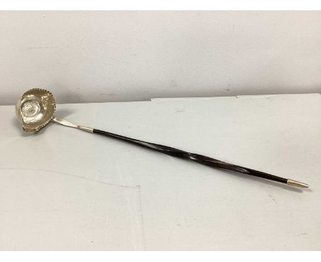 A Georgian Toddy Ladle, the bowl with fluted rim and inset 1762 threepence coin, to twisted handle, 38cm long.