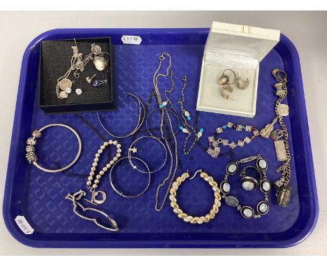 An Assortment of "925" and Other Jewellery, to include hardstone inlaid ring and bracelet set, Pandora charm bangle, baby ban