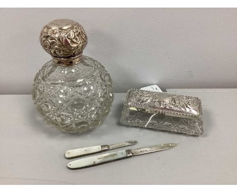 A Victorian Hallmarked Silver Mounted Cut Glass Scent Bottle, (makers mark rubbed), London 1904, of decorative scrollwork in 