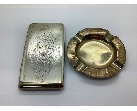 A Hallmarked Silver Ashtray, D.Bros, Birmingham 1922, of circular form with engine turned rim and four cigarette rests, (dent