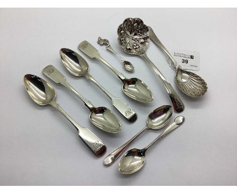 An Assortment of Silver Flatware, to include a decorative fruit spoon, each panel depicting assorted fruits in relief, four m