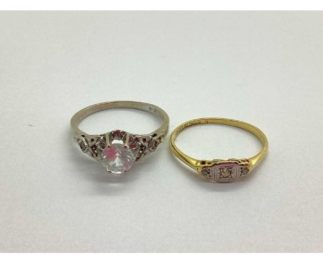 An Antique Style Three Stone Diamond Ring, the brilliant cut diamonds circular collet set within starburst setting (damages),
