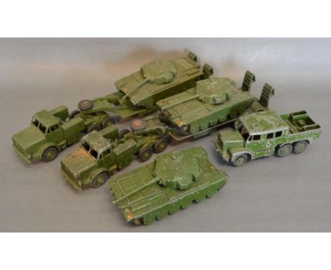 A Dinky Supertoys Tank Transporter No. 660 together with a Dinky Toys Centurion Tank No. 651 and another similar Dinky Supert