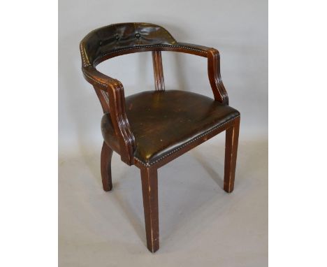 A Mahogany and Leather Upholstered Office Armchair, the button upholstered back above a stuff over seat with metal studs rais