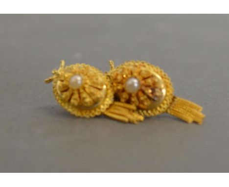 A Pair of High Grade Yellow Metal Ear Clips each set with a Central Pearl 