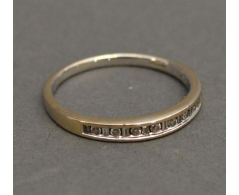An 18ct. White Gold Diamond Set Half Eternity Ring 