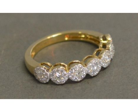 A 9ct. Yellow Gold Seven Stone Diamond Ring, approximately 0.60 ct 