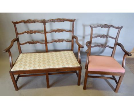 A Mahogany Chippendale Style Child's Drawing Room Suite comprising two seater settee with matching armchair, both with carved