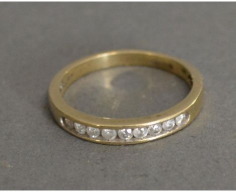 A 9ct. Gold Diamond Band Ring 