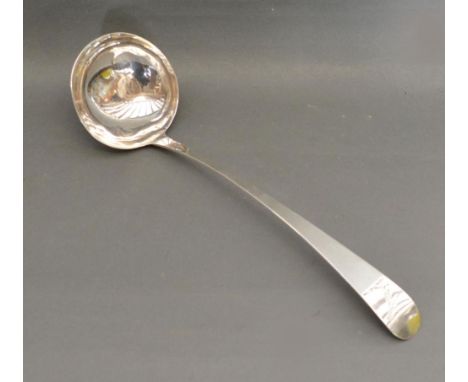 An Irish Silver Large Ladle (marks rubbed), 36cms long 