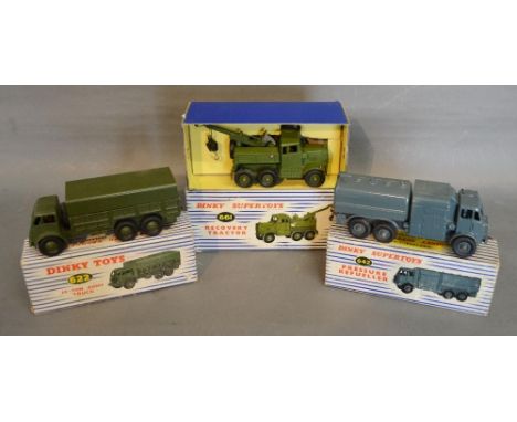 A Dinky Toys No. 622 10 Ton Army Truck together with a Dinky Toys No. 661 Recovery Tractor and a Dinky Supertoys No. 642 Pres