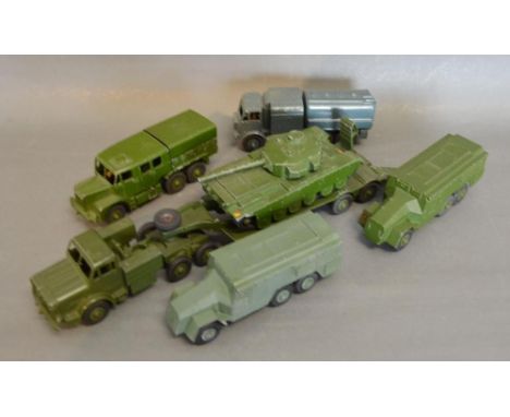 A Dinky Supertoys Tank Transporter No. 660 together with a Dinky Supertoys 651 Centurion Tank and a Dinky Supertoys Medium Ar