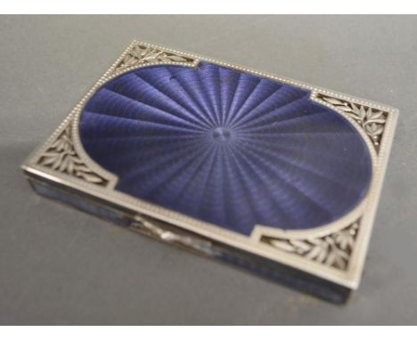 A 925 Silver and Enamel Compact, the hinged cover with mirror and silver gilt interior, 9 x 6 cms 