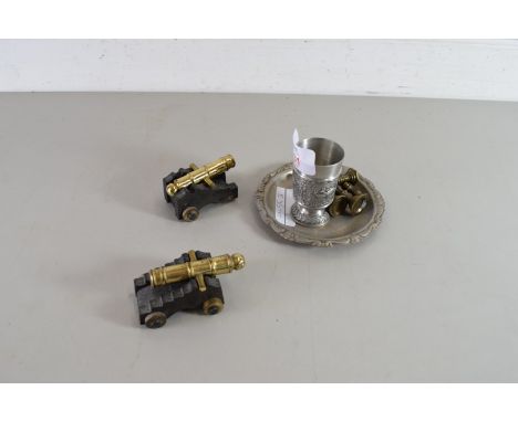 MIXED LOT COMPRISING FOUR MINIATURE BRASS CANDLESTICKS, PAIR OF MINIATURE CANNON, SMALL PEWTER WHISKY TOT AND A FURTHER SILVE