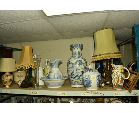 A COLLECTION OF CERAMICS AND TABLE LAMPS, comprising a large blue and white Oriental vase decorated with a dragon design, hei