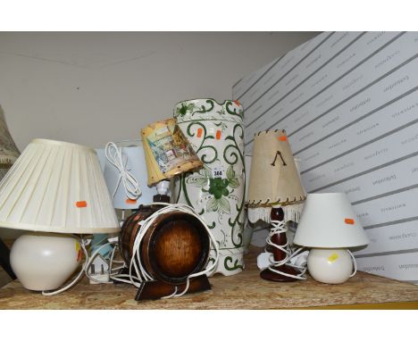 EIGHT TABLE LAMPS AND A CERAMIC UMBRELLA STAND to include four high street brand table lamps, comprising a pair of turquoise 