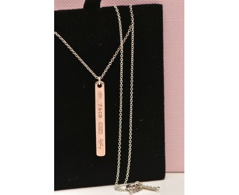 A TIFFANY &amp; CO. PENDANT NECKLACE, the T&amp;Co 1837 pendant in rubedo metal, with facsimile Tiffany signature, reverse st
