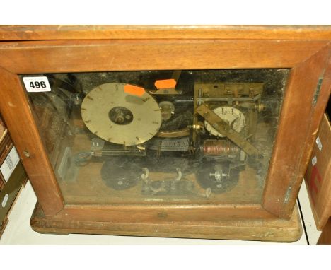 A PULSYNETIC IMPULSE CLOCK/TIMER, not tested, would benefit from a clean, contained in a glass doored wooden case, missing ke