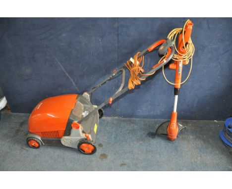 A FLYMO LAWN RAKE COMPACT 340 and a Black and Decker strimmer (both PAT pass and working)