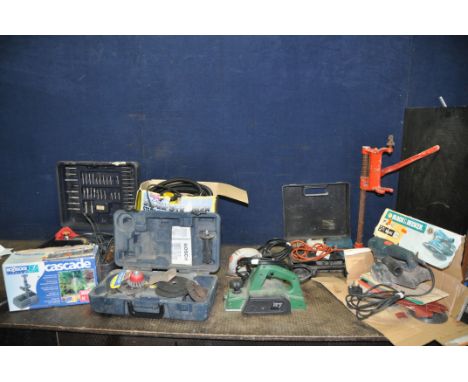 A COLLECTION OF POWER TOOLS including a Toledo electric planer, a Performance Pro 1/2in Router, a Black and Decker Multi sand
