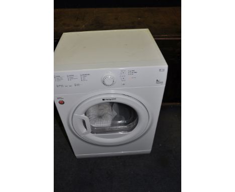 A HOTPOINT TVFS63 TUMBLE DRYER with outlet pipe width 60cm depth 50cm height 85cm (PAT pass and working)