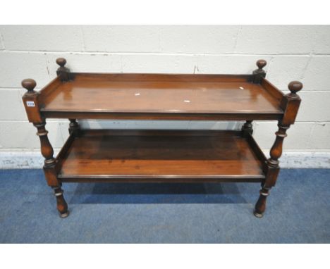 AN EDWARDIAN MAHOGANY TWO TIER BUFFET, each corner with finials, raised on turned supports, width 122cm x depth 47cm x height