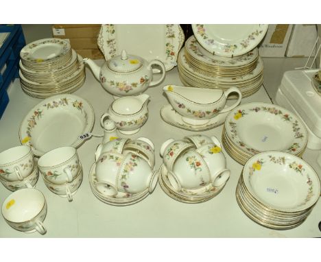 A COLLECTION OF WEDGWOOD DINNERWARE 'MIRABELLE', comprising of one meat plate, one oval serving tureen, ten dinner plates, ei