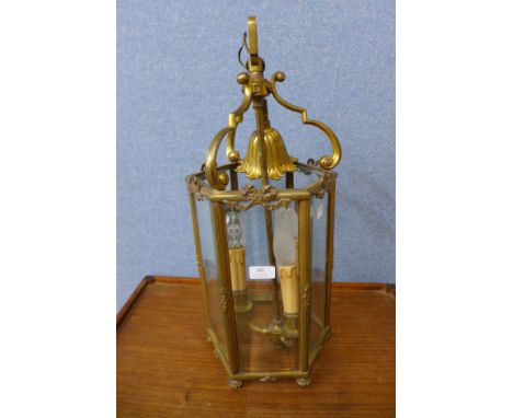 A gilt metal hanging ceiling lantern