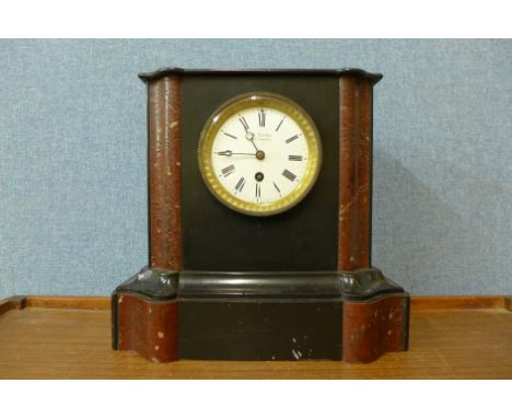 A French style faux marble mantel clock