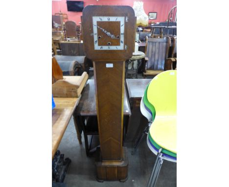 An Art Deco oak dwarf longcase clock