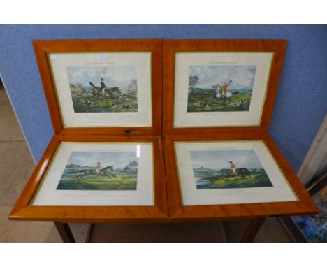 A set of four hunting scene prints, maple frames
