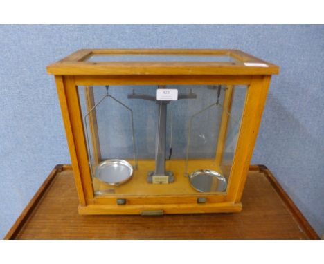 A set of chemical scales, oak case