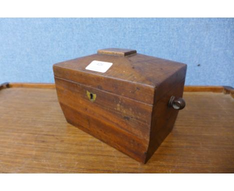 A George III mahogany sarcophagus shaped tea caddy