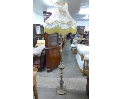 A brass standard lamp