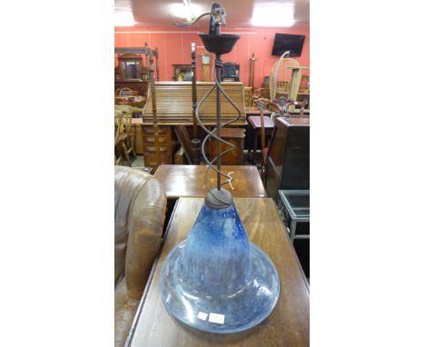 A hand blown glass and metal ceiling light