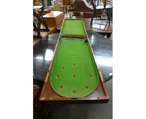 A Victorian mahogany folding bagatelle board