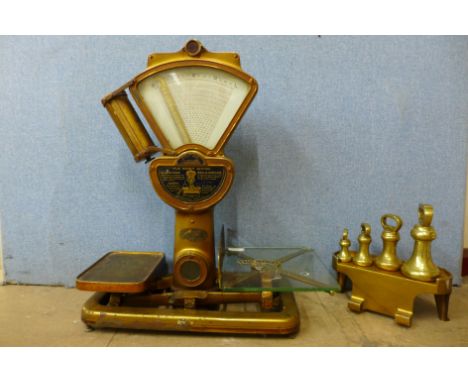 A set of Automatic Scale Co. brass scales and weights 