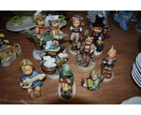 Nine Goebel figures including Tree Trimming Time BH12, Good Friends, Chimney Sweep Boy, Boy with Goats, Angel etc