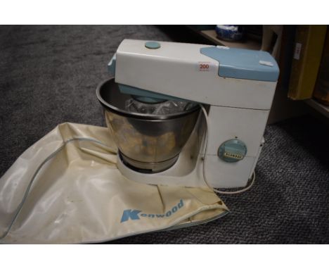 A 1960s Kenwood Chef mixer with two stainless steel bowls and K beater.