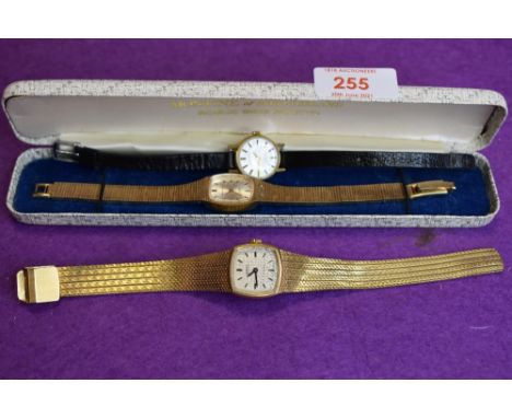 Two Gent's and lady's matched vintage dress watches by Montine, both having baton numeral faces and gold plated straps, and a