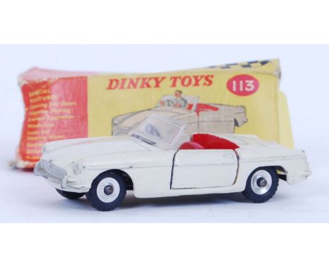 An original diecast Dinky white sports car convertible 113. Box damaged, but car is still within original box.&nbsp;

POSTAGE