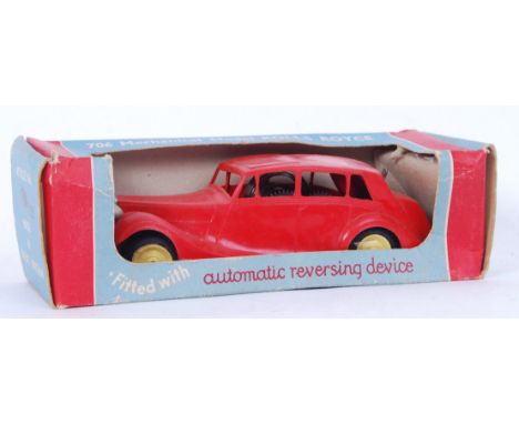 An original 706 Mechanical Model Rolls Royce with automatic reversing device. Within original box.&nbsp;

POSTAGE: Worldwide 